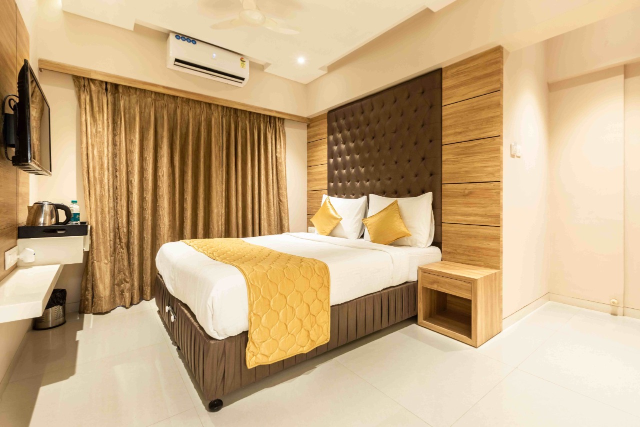 Stylish and comfortable hotel room at Hotel Pacific Residency.